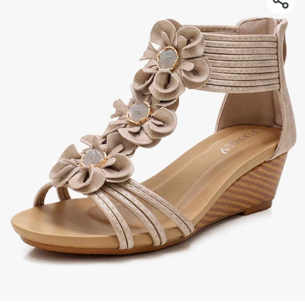 Super cute flower cut out wedge sandals.